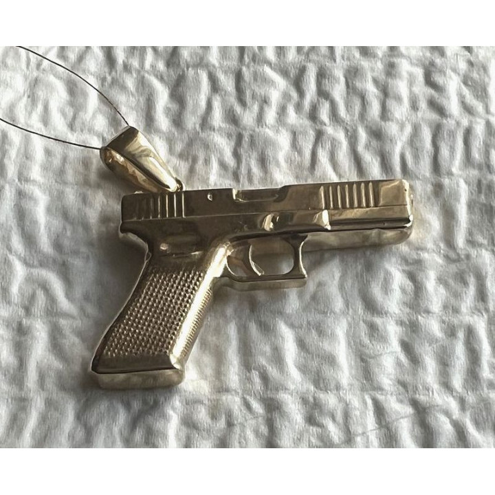 ZŁOTY PISTOLET - zawieszka